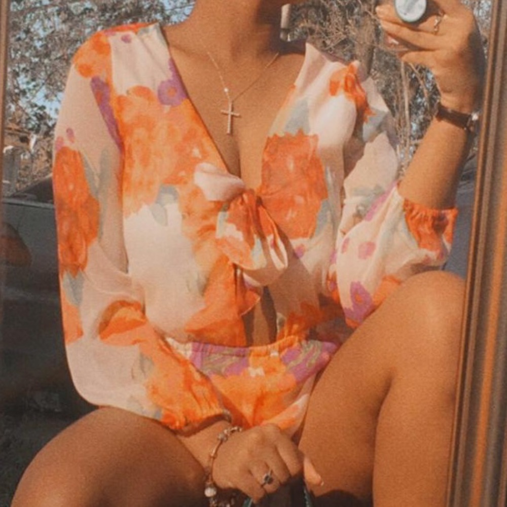 Short Floral romper with V neck /size medium